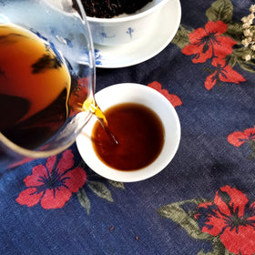 ChaWuWarmSun JinYaGongTing in ceramic teapot scene, inviting relaxed tea rituals.