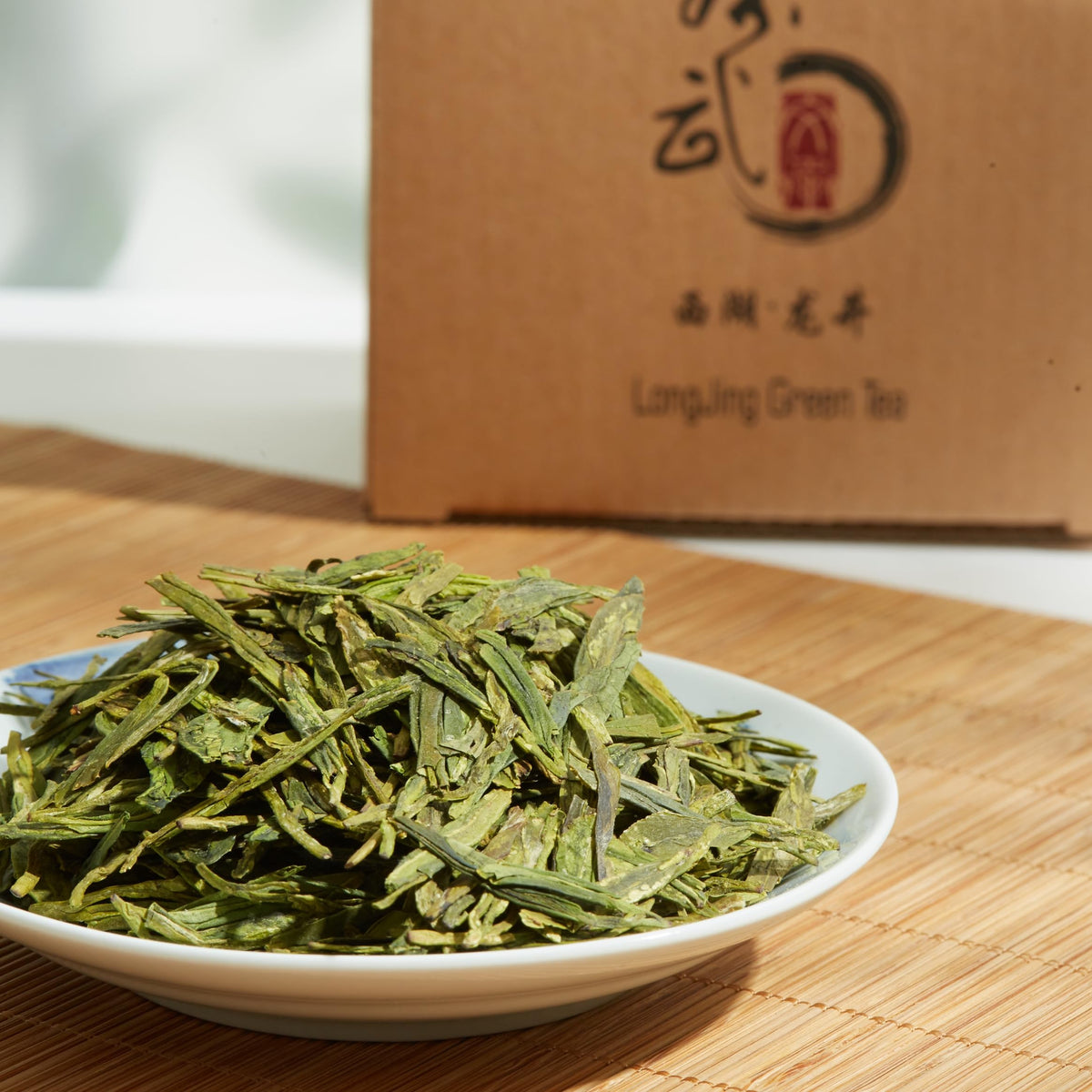ChaWuWarmSun LongJing loose leaf close-up stresses whole-leaf integrity.