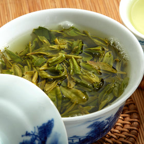ChaWuWarmSun steaming cup captures inviting color and aroma.