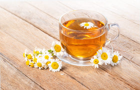 Cha4TEA brewed cup with steam illustrates a soothing nighttime ritual.