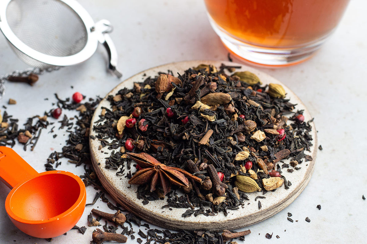 Cha4TEA warm-spice ritual in a steaming cup.