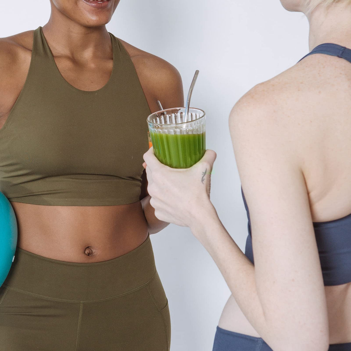 Chaism cup with foamy matcha latte demonstrates creamy texture.