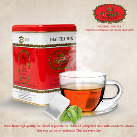 ChaTraMue Red Label tea being brewed in a cup for quick authentic Thai tea.