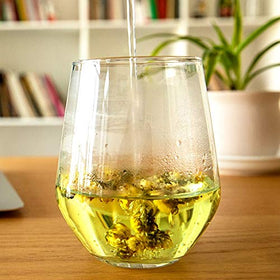 ChaWuWarmSun tea-cup-steeping, easy home ritual with soothing floral notes.