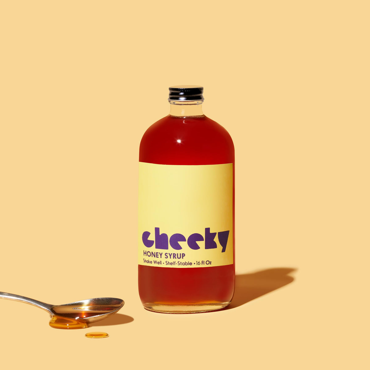 Cheeky Cocktails Honey Syrup bar setup for versatile use.
