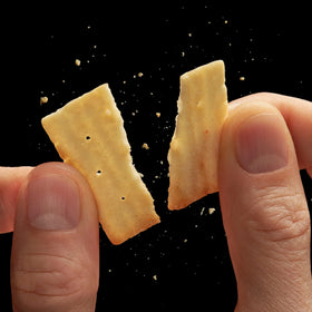 Cheez-It Grooves party snack addition with bold cheddar flavor.