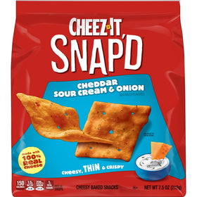 Kitchen counter scene with Cheez-It Snap'd inviting quick nibbling during study or work.