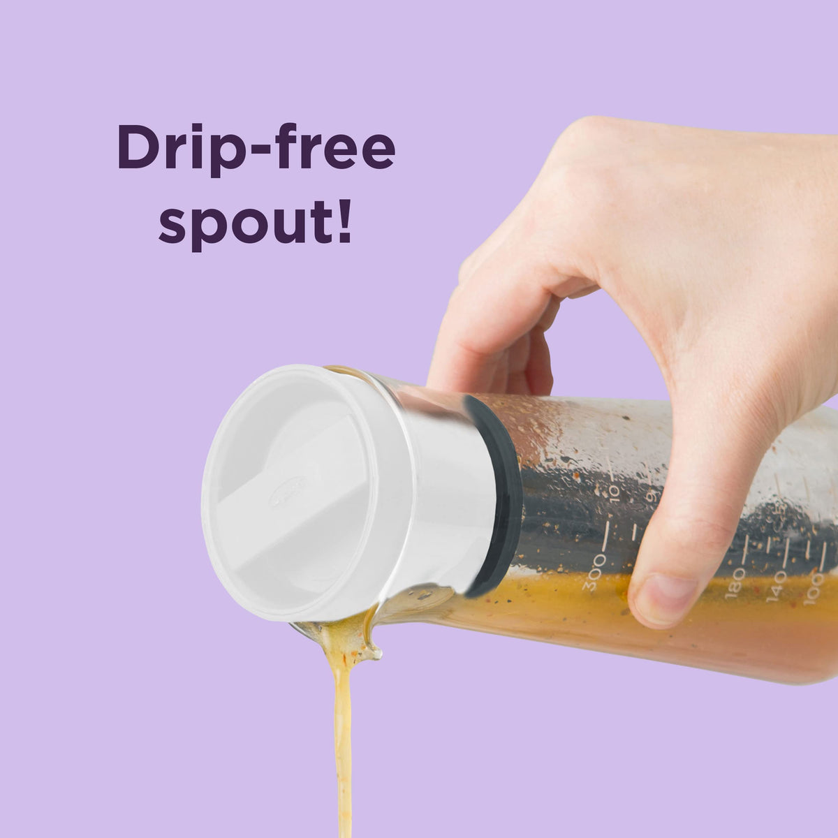 Chef'n dressing emulsifier pump stirrer blends ingredients into creamy emulsions.