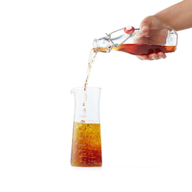 Chef'n salad dressing mixer drip-free pouring prevents mess after serving.