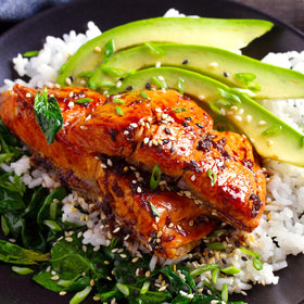 Close-up of Salmon Magic seasoning with paprika and herbs for flavor depth.