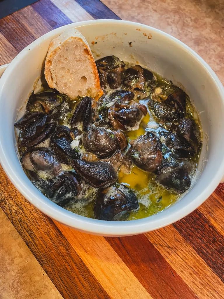 Chef's Quality escargots arranged on an appetizer platter for guests.