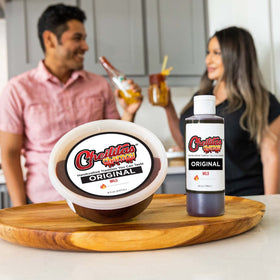 Cheilitas Chamoy Original pour on glass elevates cocktails with fruit spice.