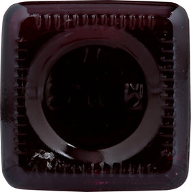 Cheri's Desert Harvest Prickly Pear Syrup magenta glass highlighting vibrant color.