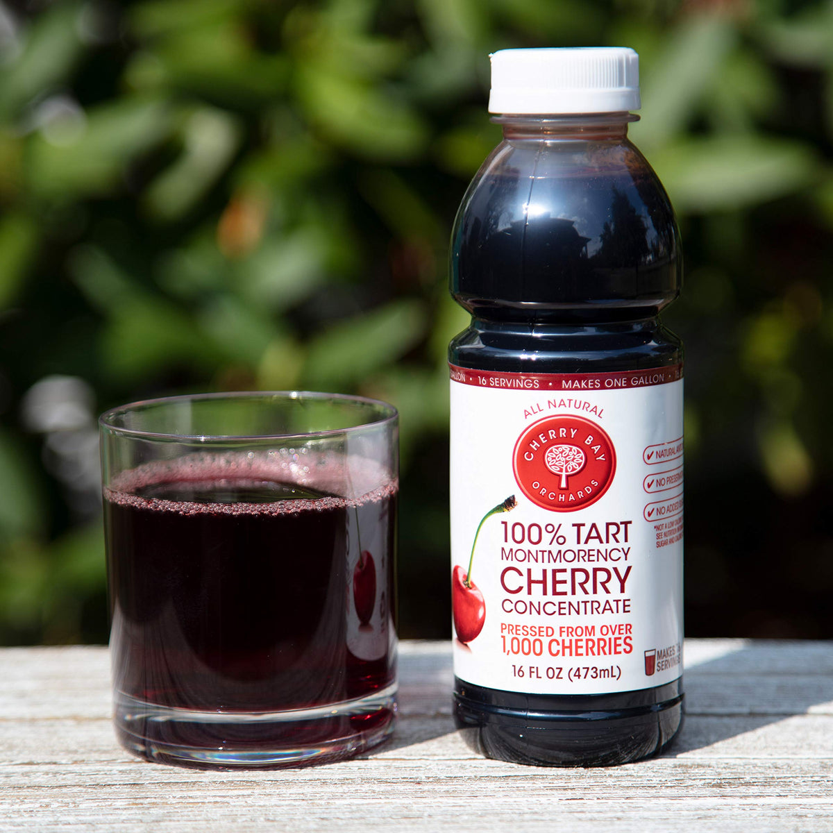 Cherry Bay Orchards Tart Cherry Concentrate back view showcases sturdy bottle.