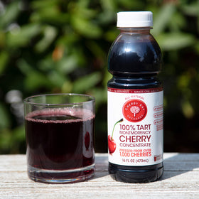 Cherry Bay Orchards Tart Cherry Concentrate back view showcases sturdy bottle.