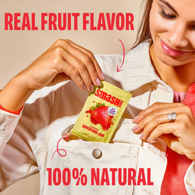 Opening a Chia Smash jam squeeze packet for on-the-go fueling