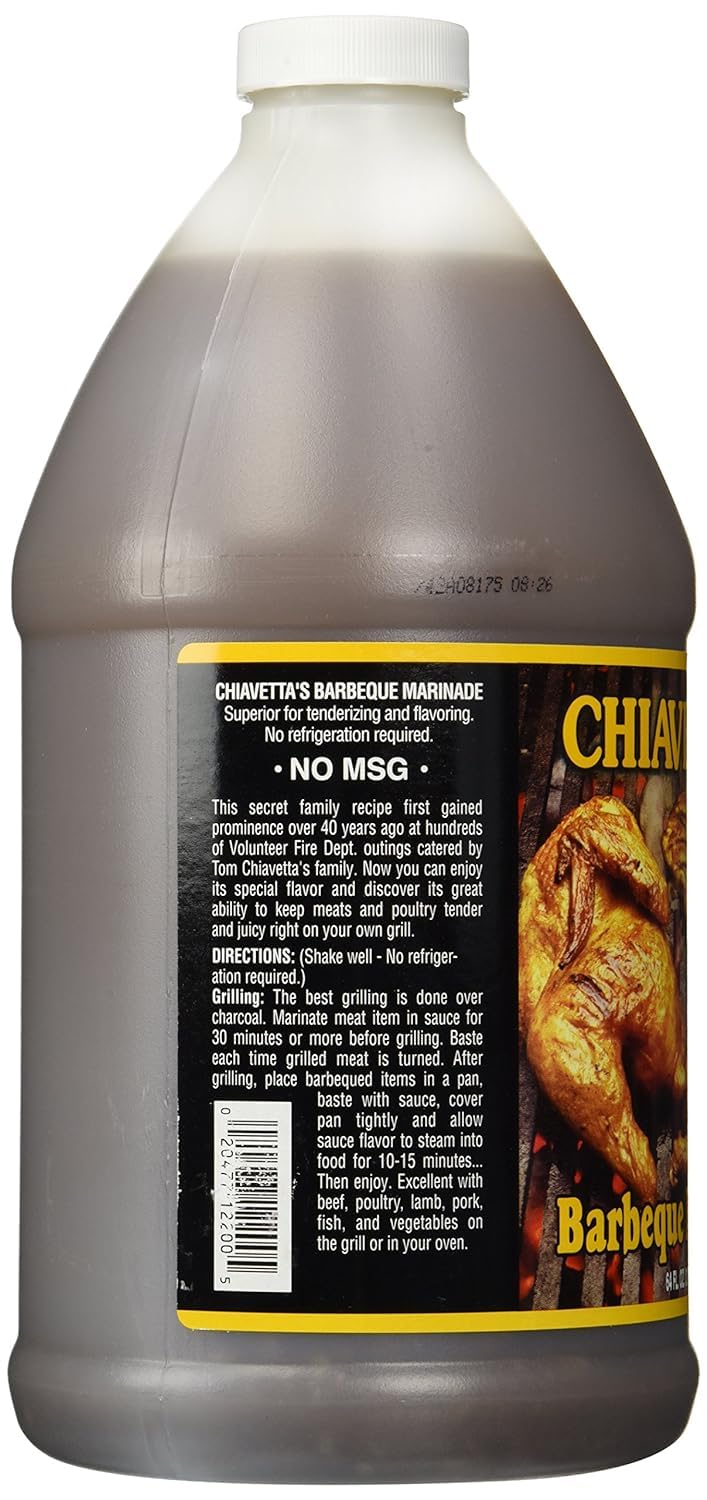 Pouring Chiavetta's marinade to season chicken for grilling.
