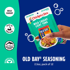 Chicken of the Sea OLD BAY tuna pouch in hand for portable protein.