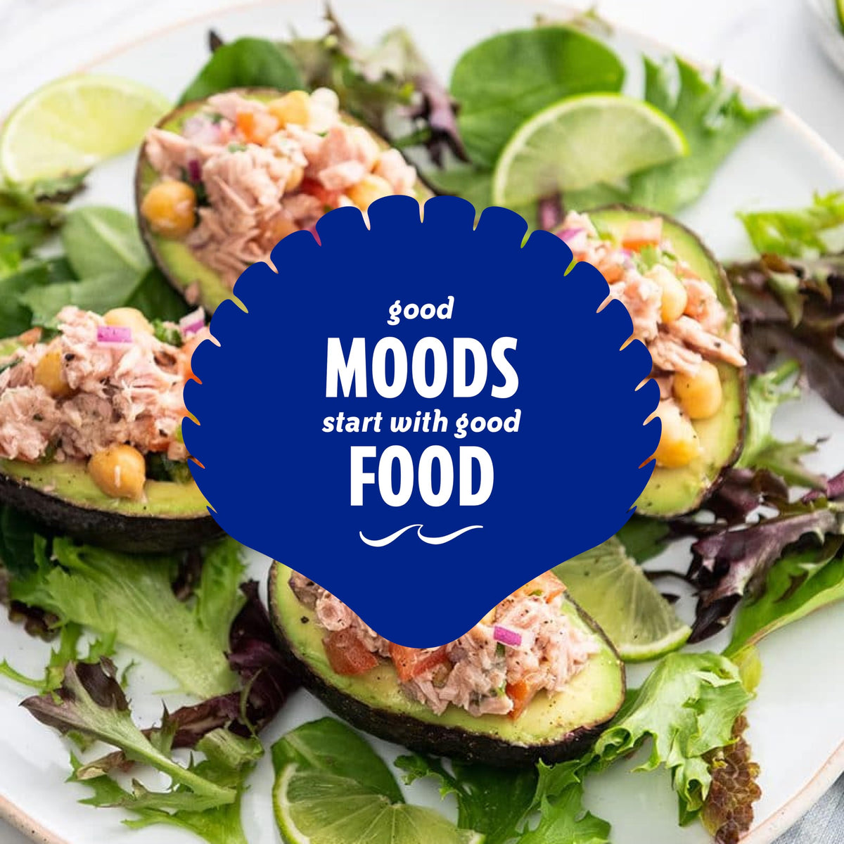Chicken of the Sea tuna in water mixed into a colorful salad bowl.