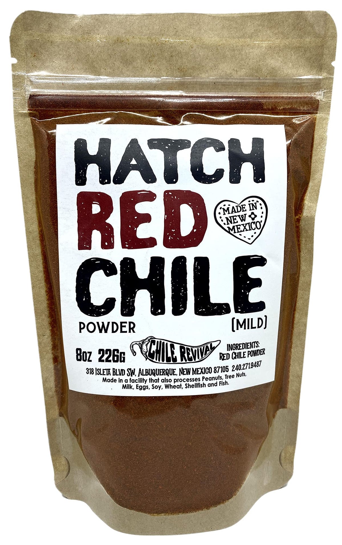 Chile Revival Hatch Red Chile Powder bottle pour, ideal for enchiladas and rich sauces.