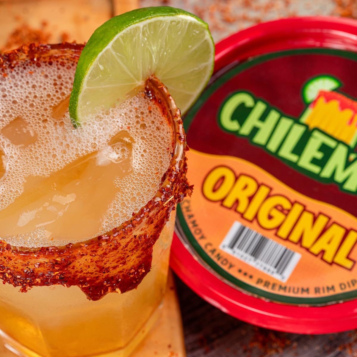 CHILEMOY Chamoy Rim Dip with fruit for a flavorful snacking experience.