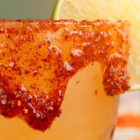 CHILEMOY Chamoy Rim Dip bottle beside Tajin-style rimmer concept for cocktails.