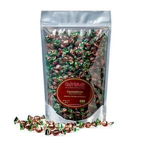 Chipurnoi Glitterati Cocoamenta candies in resealable pouch for on-the-go indulgence.