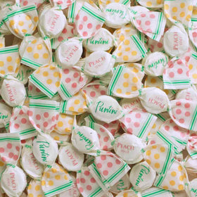 Close-up of Chipurnoi Puntini peach jujubes highlighting juicy peach flavor