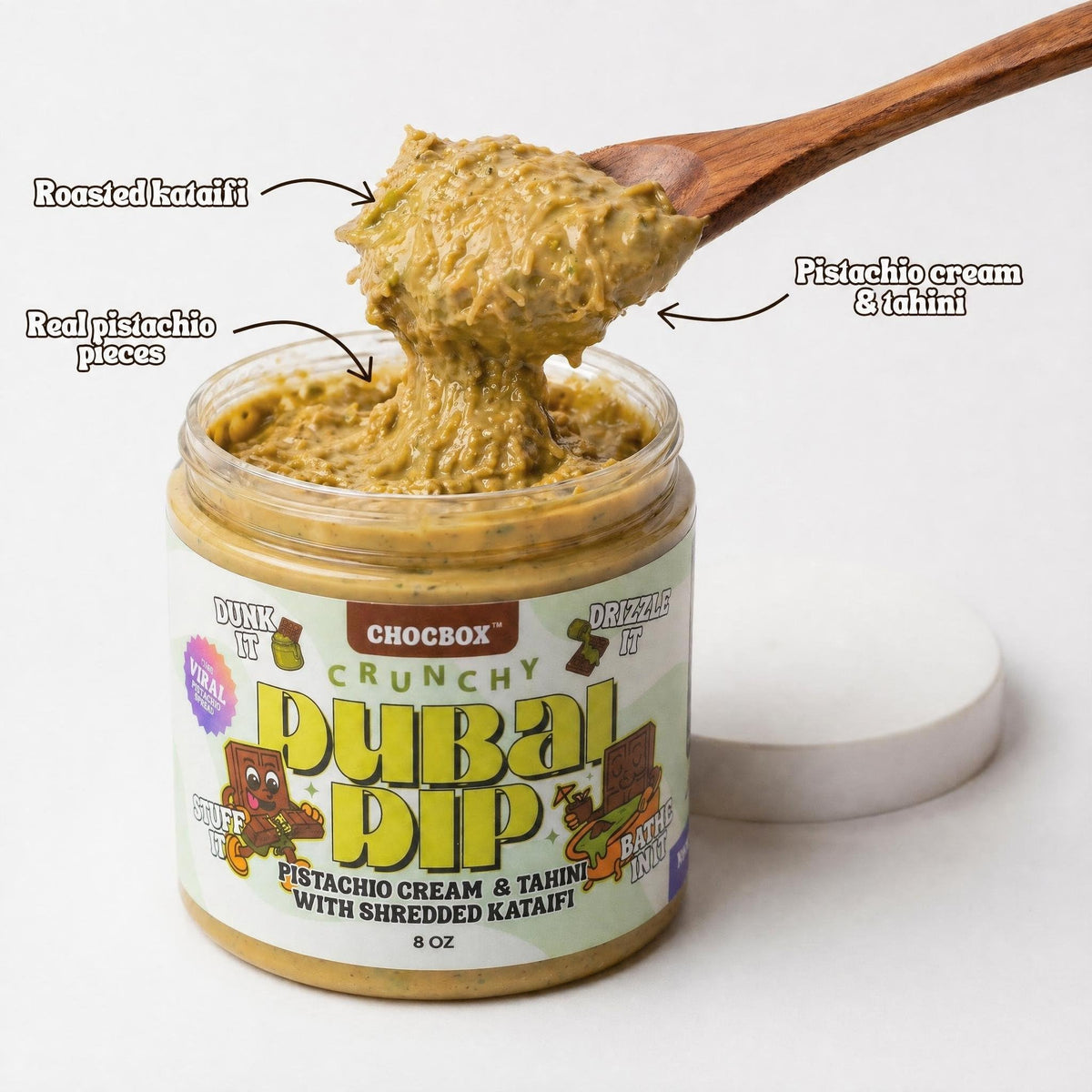 Pistachio-tahini with kataifi cross-section reveals creamy filling and crispy shards