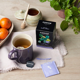 Choice Organic Teas compostable tea bags emphasizing eco-friendly packaging.