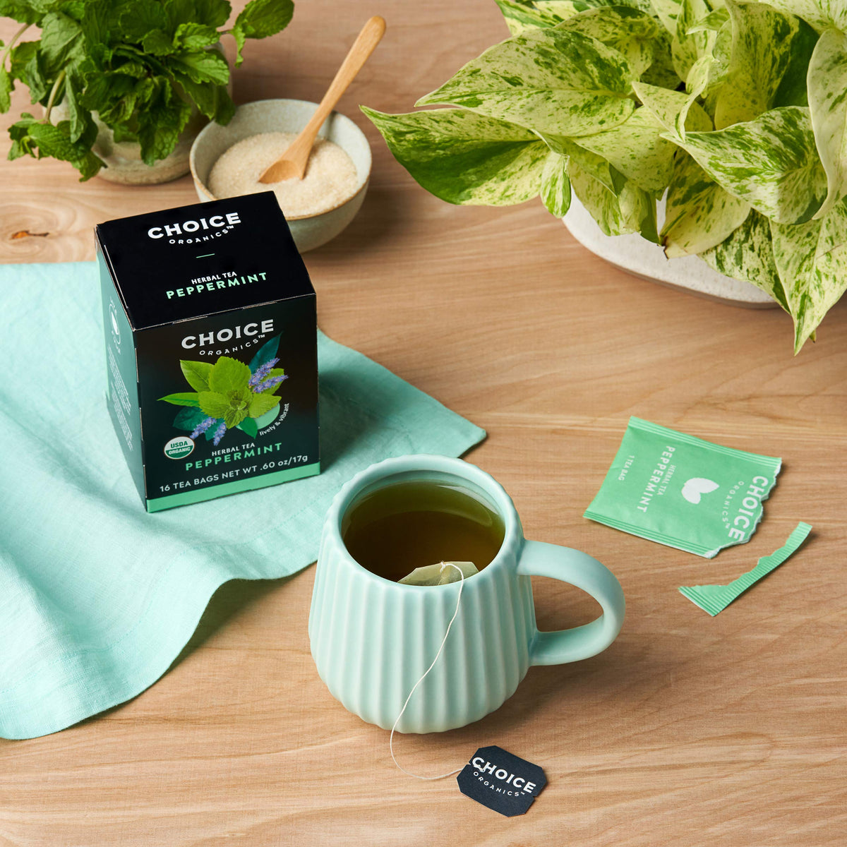 Choice Organic Teas Peppermint tea cup steaming for a soothing, caffeine-free moment.