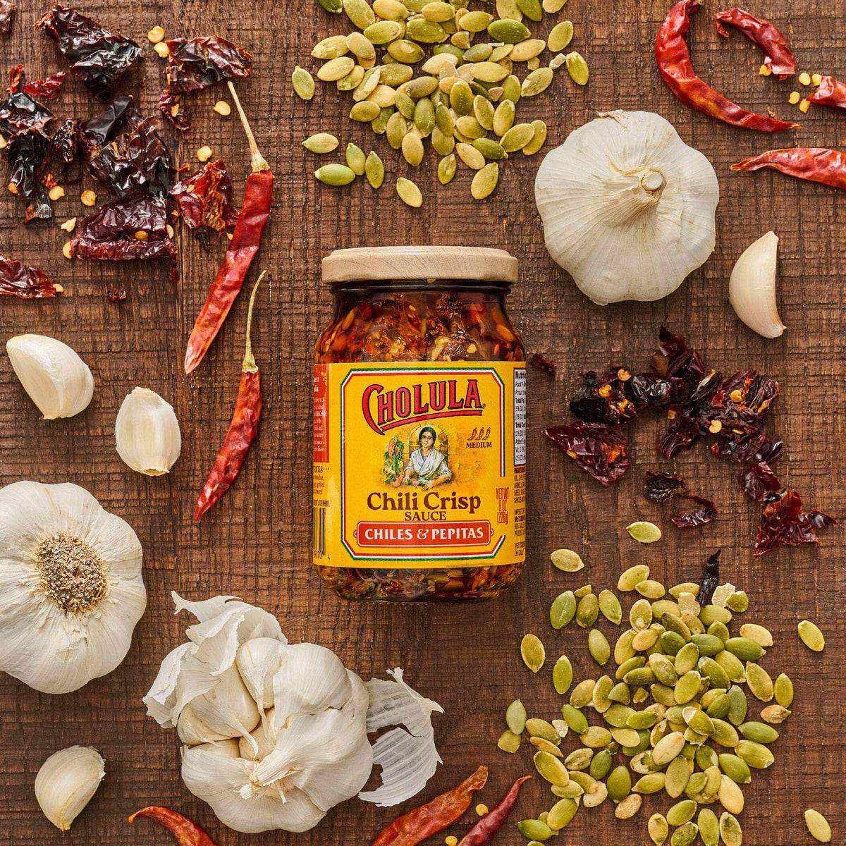 Cholula bottle with wooden cap ready to season meals.