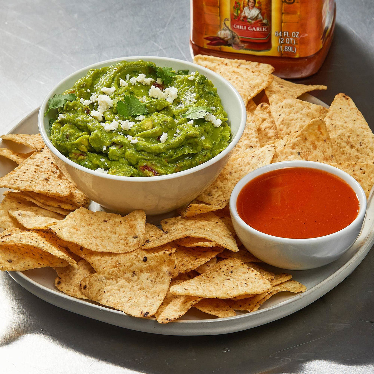 Cholula Chili Garlic enhances wings with versatile pairing possibilities.