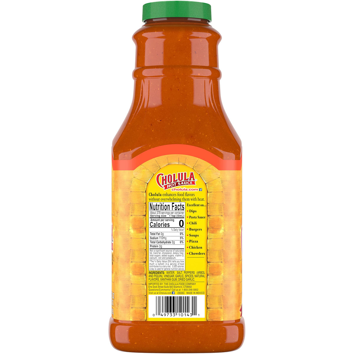 Pouring Cholula Chili Garlic Hot Sauce for controlled spice addition.