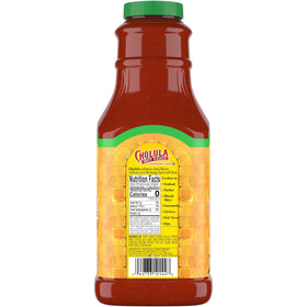 Cholula Chili Lime sauce being poured over eggs for a zesty finish