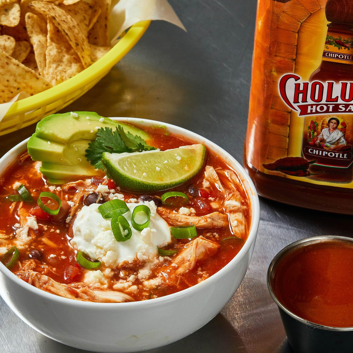 Cholula Chipotle sauce drizzled over corn for a smoky finish.