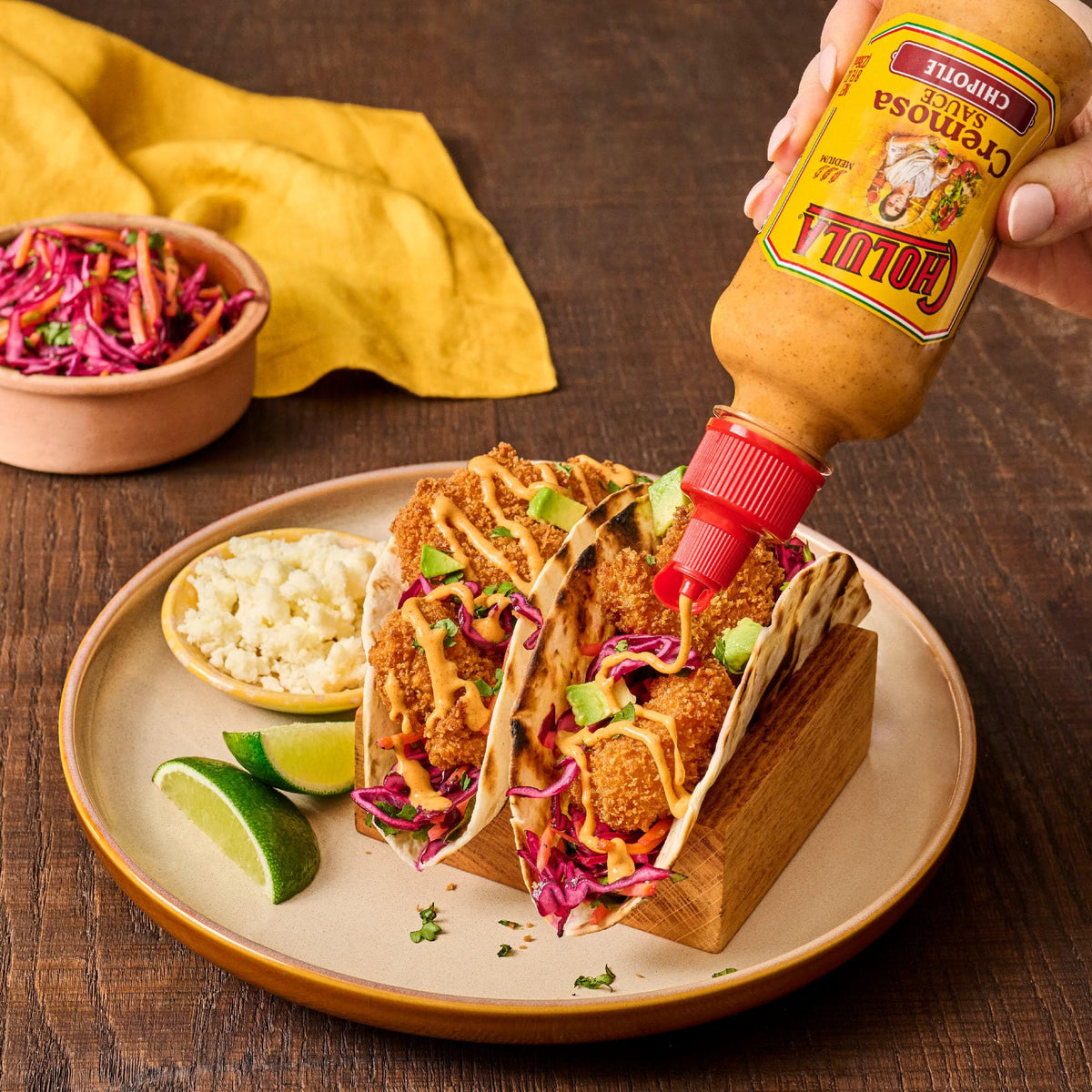 Cholula Chipotle Cremosa on elotes and tostadas enhances flavor with creaminess.