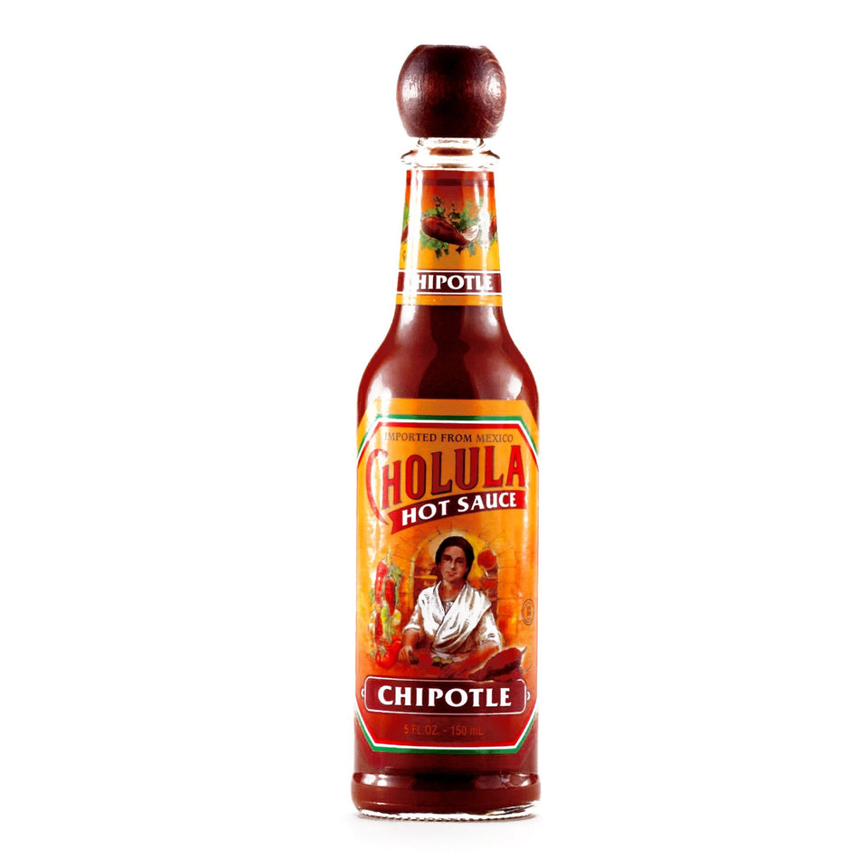 Cholula Chipotle hot sauce bottle adds smoky flavor to tacos and eggs.