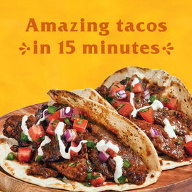 Cholula garlic-onion spice packaging showcases versatile seasoning for multiple dishes.