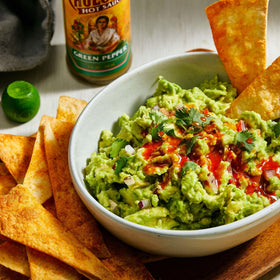 Cholula Green Pepper Hot Sauce with dips demonstrates versatility.