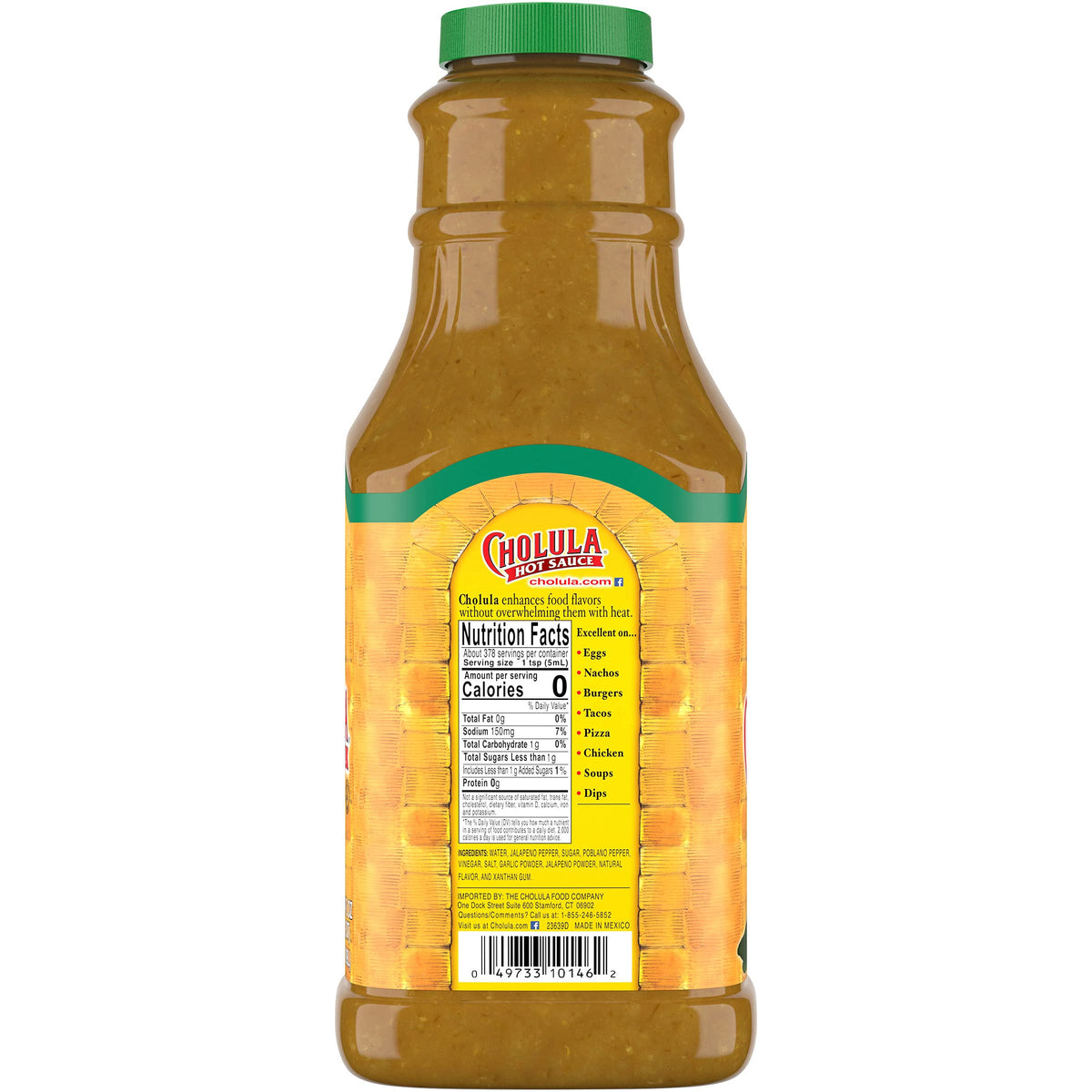 Cholula Green Pepper Hot Sauce bottle ready to dispense in a busy kitchen.