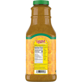 Cholula Green Pepper Hot Sauce bottle ready to dispense in a busy kitchen.