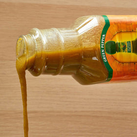 Close-up of peppers in Cholula sauce for authentic Mexican flavor.