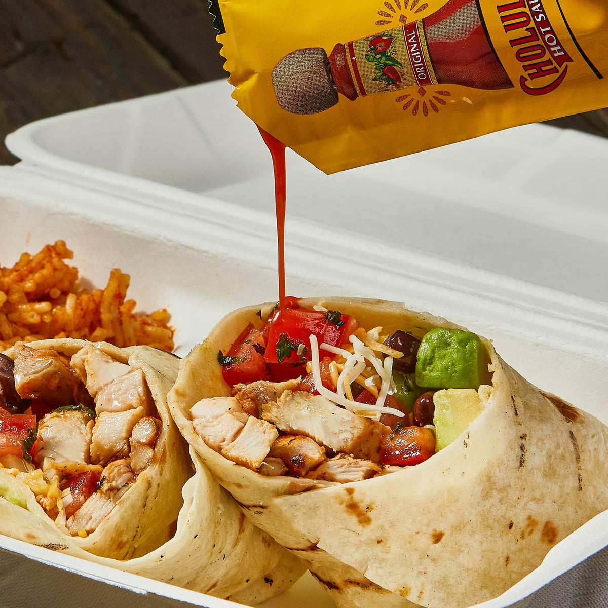 Cholula packets with fries for a quick dipping option.