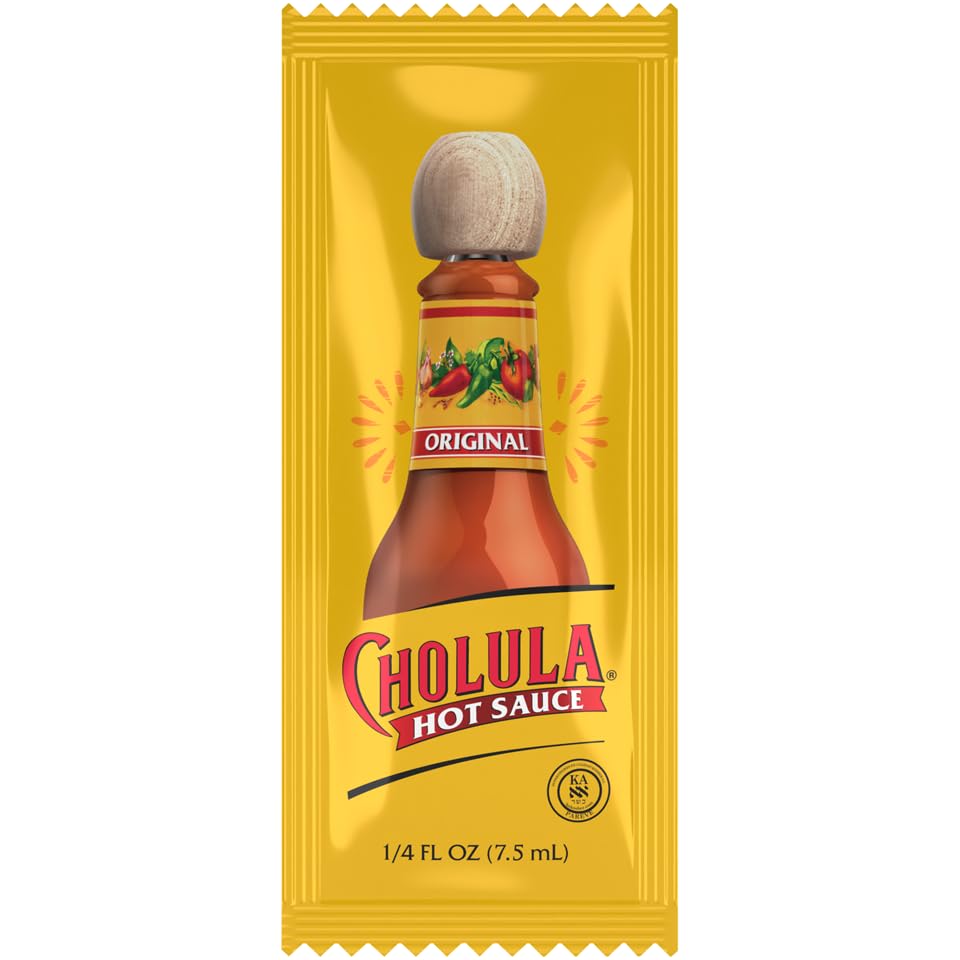 Closeup of Cholula packets with foil seal for freshness and takeout.