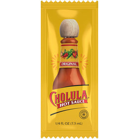 Closeup of Cholula packets with foil seal for freshness and takeout.