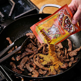 Cholula queso dip with chili garlic adds a zesty kick.