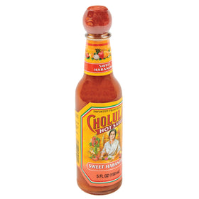 Cholula Sweet Habanero being poured to reveal fruity heat and smooth texture.