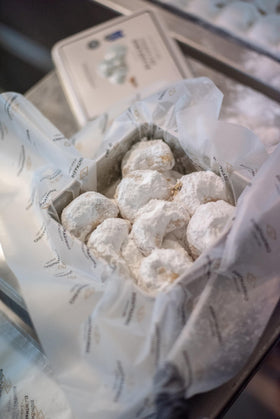 Chrisanthidis Kourabie cookies on a plate, ideal for celebrations