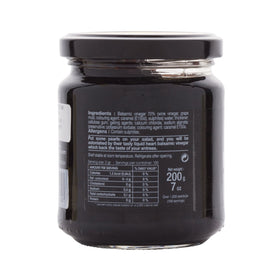 Christine Le Tennier balsamic pearls on salad, a playful topping that enhances appetizers.